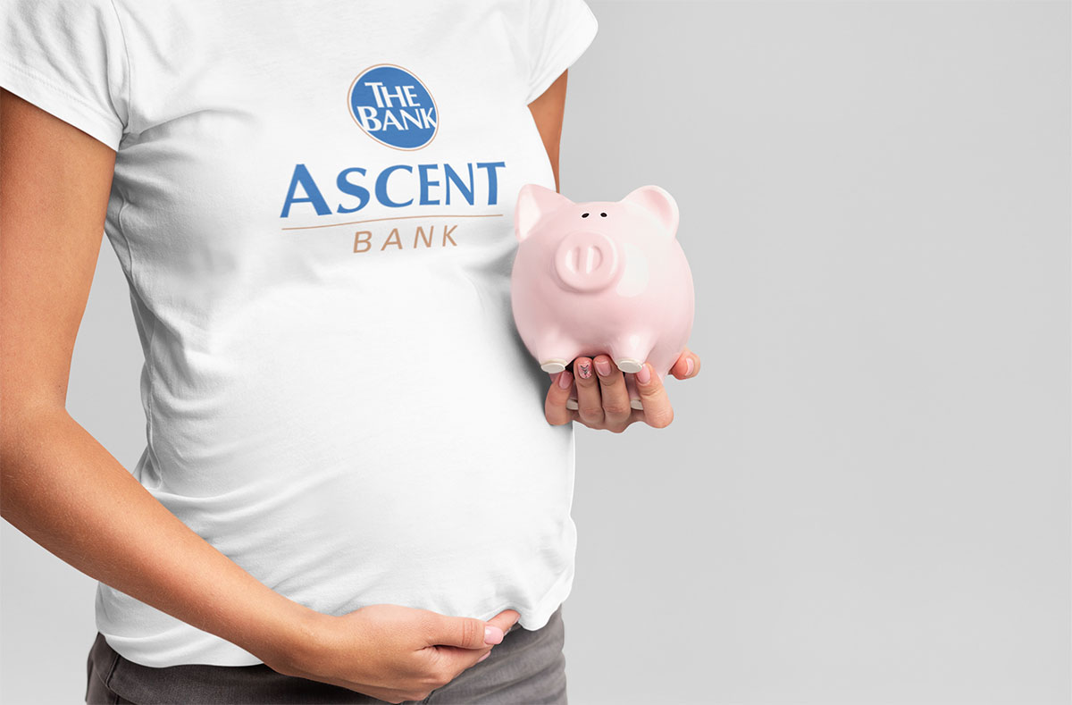 pregnant woman holding a piggy bank savings account helena mt